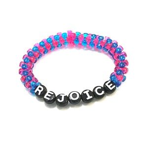 2/$12 Pink and Blue “Rejoice” Bead Bracelet